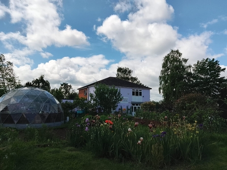 Outdoor garden room and building at Oasis community centre