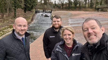 Eel pass at Rufford Mill weir with four people