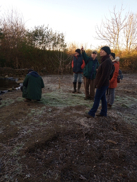 Group of people filming on an allotment plot